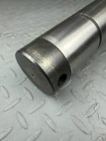 Палец ТО-18Б.14.00.002 (80х215) г/ц ковш-кором= 1шт.,г/ц ковш-п/рам= 1 шт.